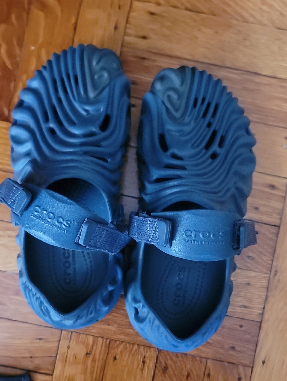 Salene Dembury CROCS  Swirled Navy Blue Foam Sandals with Adjustable Strap